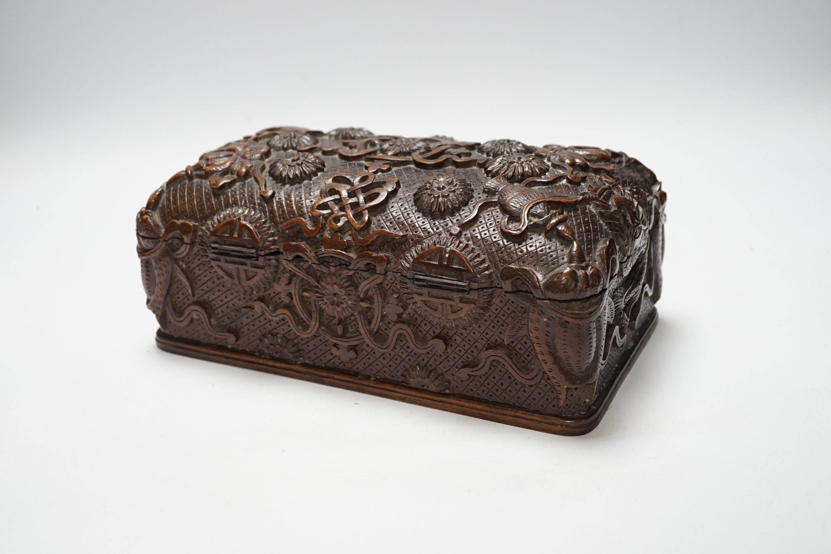 A Burmese carved teak box, early 20th century, 25cm wide x 13cm deep